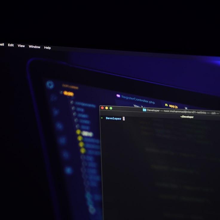 Mobile app project planning workspace with devices and development tools